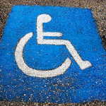 Signs vs. stencils: what are the ADA requirements for disabled parking spots?