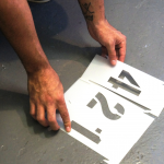How to stencil parking lot identification numbers