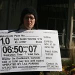 Should private companies issue parking tickets?