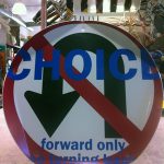 Artist Transforms Parking Signs into Charitable Contributions